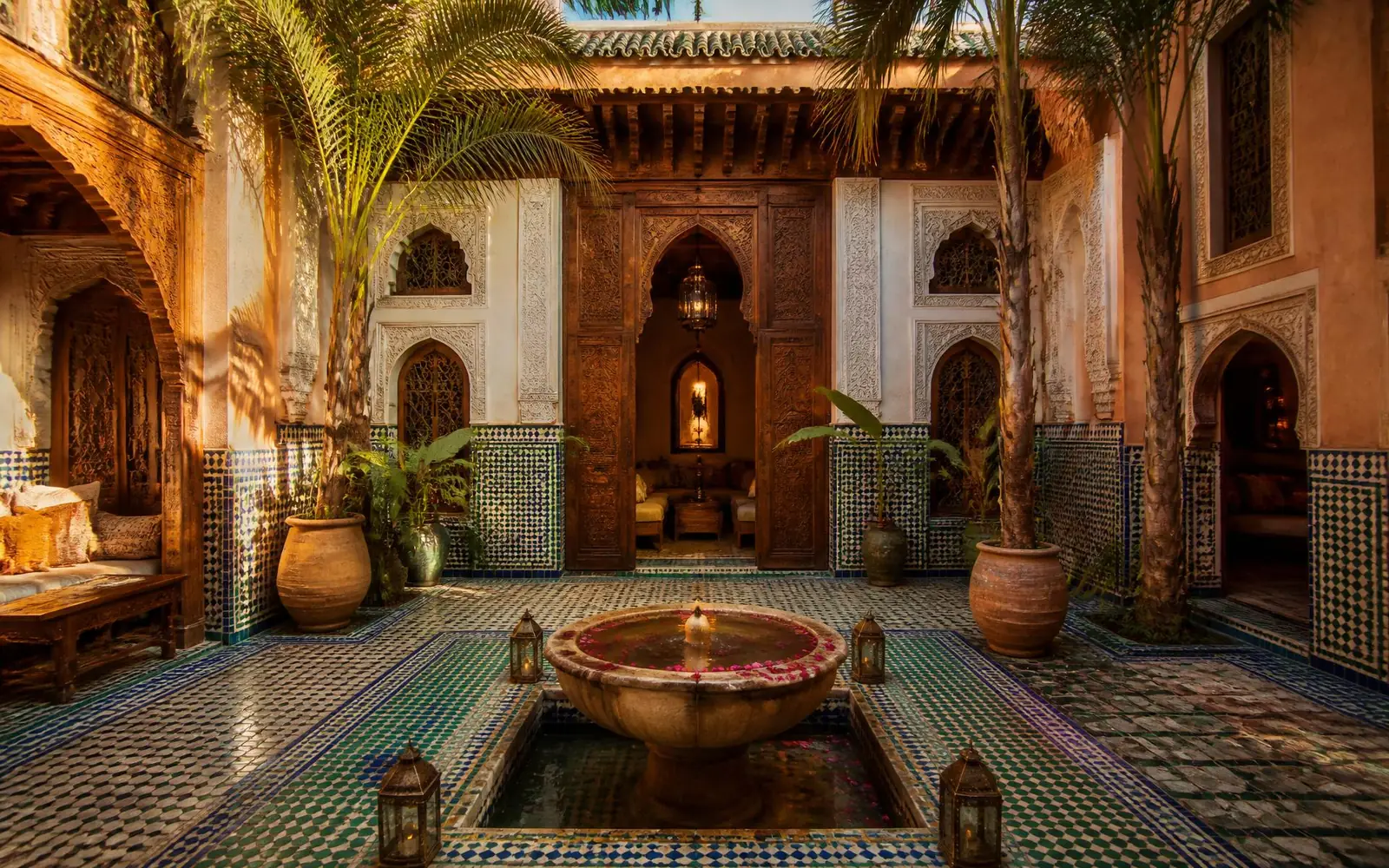 Moroccan riad courtyard at golden hour